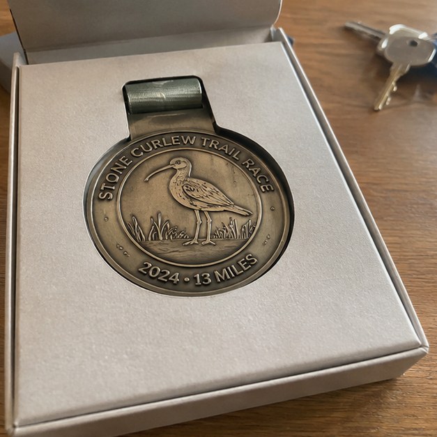 Race medals with logo — customer photo